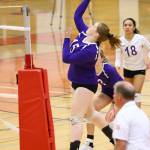 Emily Lamb hits for Oak Harbor in the E-W match.(Photo by John Fisken)