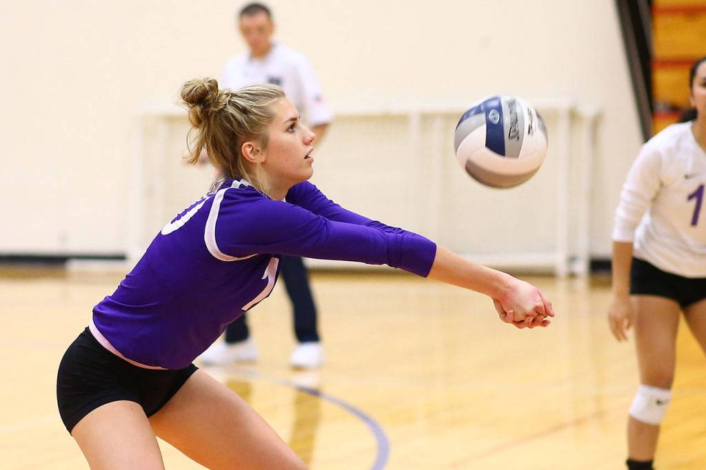 Morgan Pease gets the offense started with a pass.(Photo by John Fisken)
