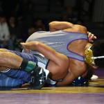 Oak Harbors Jamal Graham pins David Huerta.(Photo by John Fisken)