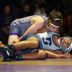 Oak Harbors Timothy Powers, top, takes control of Jose Aguilar-Lorenzo.(Photo by John Fisken)