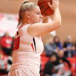 Avalon Renninger scans the court for an open teammate.(Photo by John Fisken)