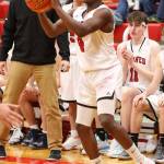 Jean Lund Olsen looks to run the offense for the Wolves.(Photo by John Fisken)