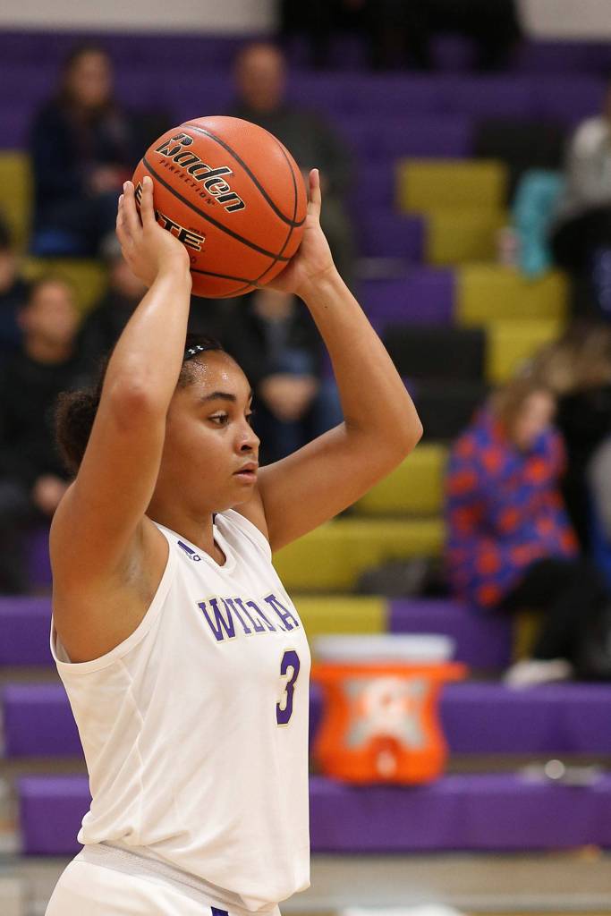 Tiana Jackson inbounds the ball for Oak Harbor.(Photo by John Fisken)