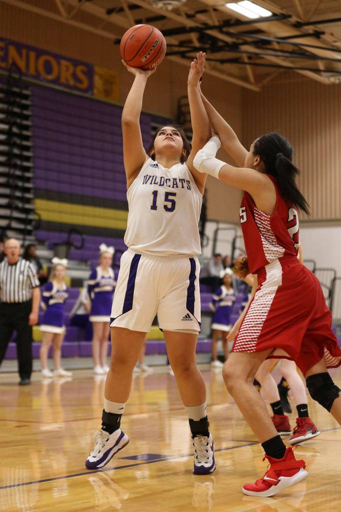 Anabel Thayer (15) attempts to score for Oak Harbor.(Photo by John Fisken)