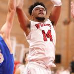Jacobi Pilgrim muscles his way to the rim.(Photo by John Fisken)