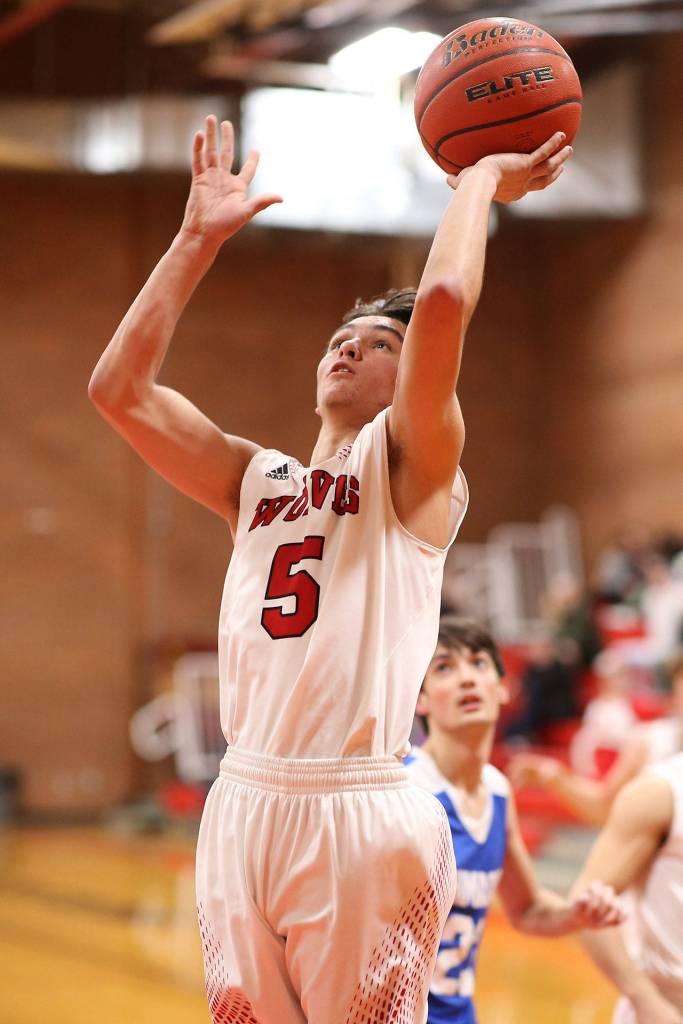 Hawthorne Wolfe collects a bucket for Coupeville.(Photo by John Fisken)