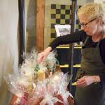 Photos by Patricia Guthrie/Whidbey News Group                                WhidbeyWaxWorks artisan and owner Prescilla Lowry crafts candles each year for the holiday season.