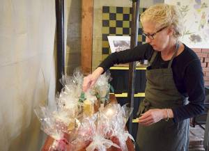 Photos by Patricia Guthrie/Whidbey News Group                                WhidbeyWaxWorks artisan and owner Prescilla Lowry crafts candles each year for the holiday season.