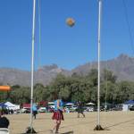 Tishia Malone tries to throw a bag of rope over a bar in the Highland games. (Provided photo)
