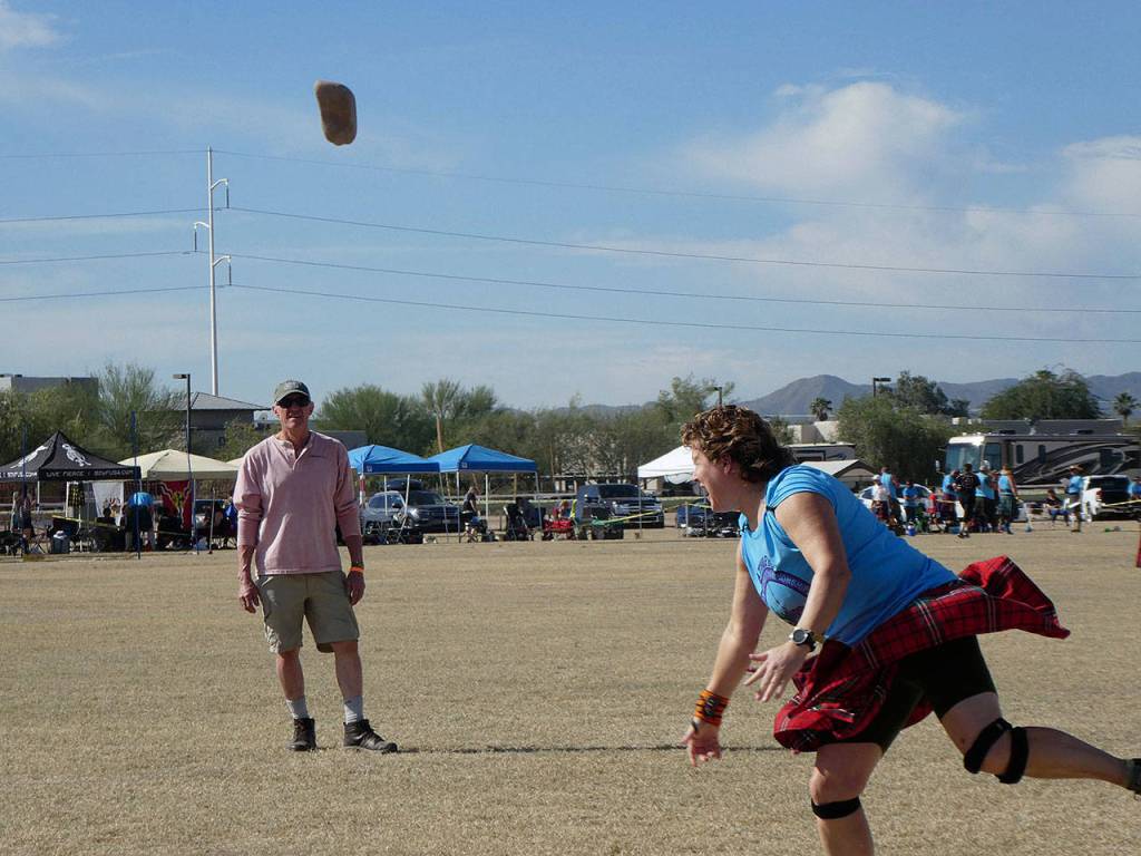 Tishia Malone hurls a stone at the World Championships in November. (Provided photo)