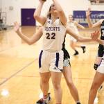 Paige Fortin puts up a shot for Oak Harbor.(Photo by John Fisken)