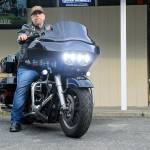 Mark JarHead Douglass, president of Brothers-in-Arms Motorcycle Club, North Puget Sound Chapter, parks his bike in front of All Sports Bar & Grill. The group will host its monthly raffle fundraiser Bike Night Jan. 8. Participants dont need to ride motorcycles to donate. Photo by Laura Guido/Whidbey News-Times