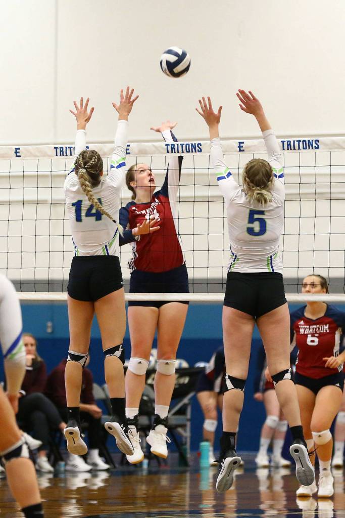 Hailee Blau (center), an Oak Harbor grad, plays volleyball for Whatcom Community College. (Photo by John Fisken)