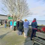 Photo courtesy of Durand Dace                                Onlookers armed with binoculars rushed to Boy and Dog Park on the morning of Dec. 24 to catch a glimpse of the passing orcas.