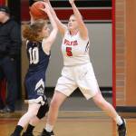 Audrianna Shaw defends Cedar Park Christians Skye Bonner (10).(Photo by John Fisken)