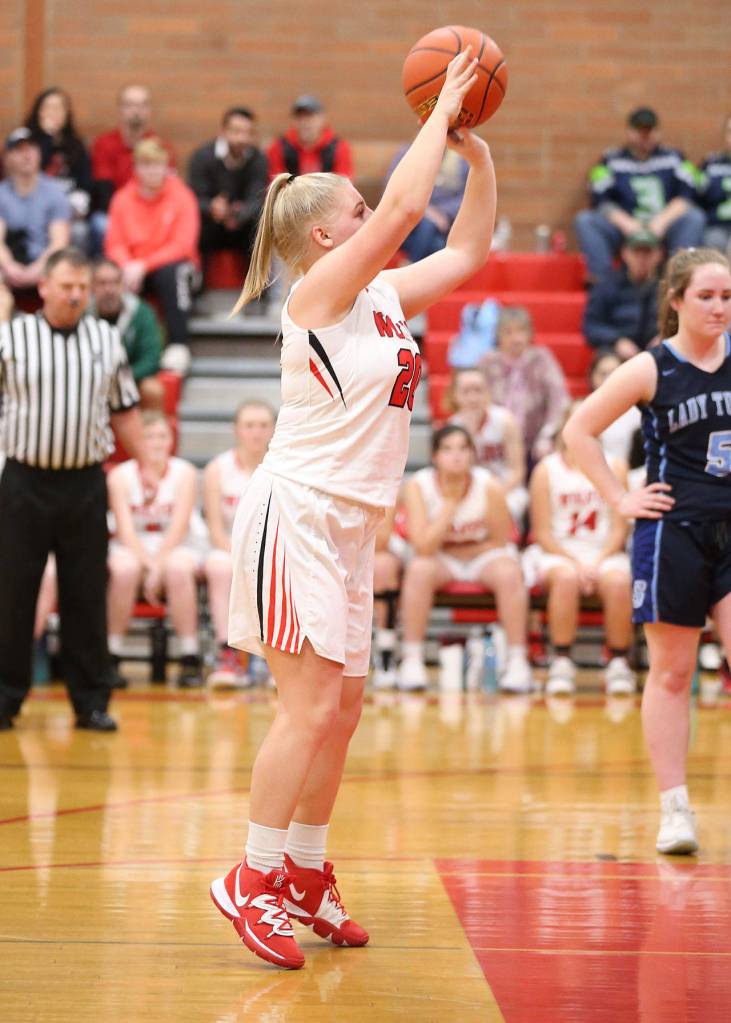 Avalon Renninger sinks two fourth-quarter free throws to give the Wolves the lead.(Photo by John Fisken)