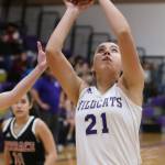 Oak Harbors Mikhaela Cortez shoots against Mountlake Terrace. (Photo by John Fisken)
