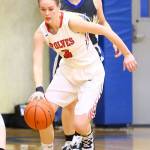 Chelsea Prescott begins to bring the ball up the floor for the Wolves.(Photo by John Fisken)