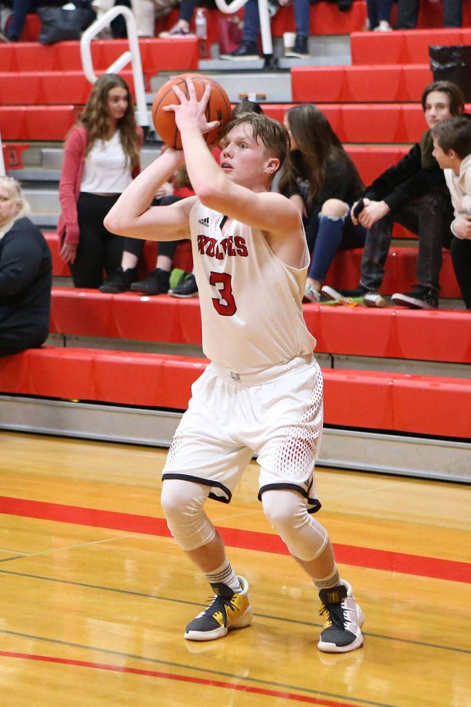 Mason Grove sets up to hit one of his four second-quarter three-pointers.(Photo by John Fisken)