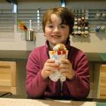 Arya Bochantin displays a finished sewn pouch, big enough to fit a sugar glider.