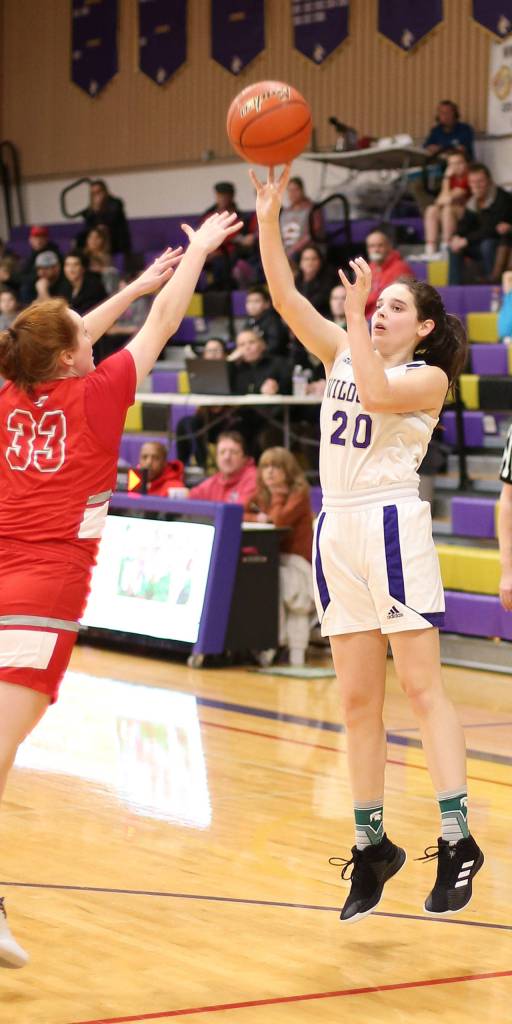 Grace Waite launches a shot for Oak Harbor.(Photo by John Fisken)