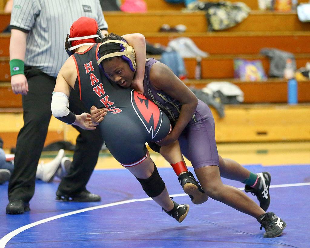 Christina Frank, right, drives Hope Ambachew of Mountlake Terrace to the mat. (Photo by John Fisken)