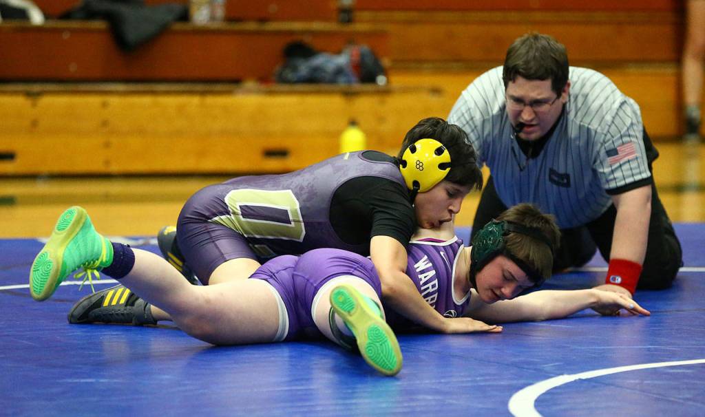 Wildcat Adelina Lopez, top, gets ready to pin Edmonds-Woodways Elle Norton.(Photo by John Fisken)