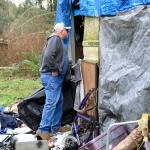 Photo by Laura Guido/Whidbey News-Times                                Dennis Phillips, of Island County Human Services, calls inside an RV to see if anyone is living there as part of the annual Point in Time count. Volunteers tried to get as accurate as a number during the one-day count, required by the federal and state governments.
