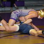 Wildcat Derek Salazar-Leyva attempts to turn Alexander Dorchak.(Photo by John Fisken)