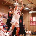 Gavin Knoblich (22) slips through the Port Townsend defense for a shot.(Photo by John Fisken)