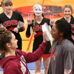 The Coupeville cheerleaders raised money for their trip to nationals by allowing themselves to be pied in the face. Here, JaTarya Hoskins, right, gets hit by Maya Toomey-Stout. (Photo by John Fisken)