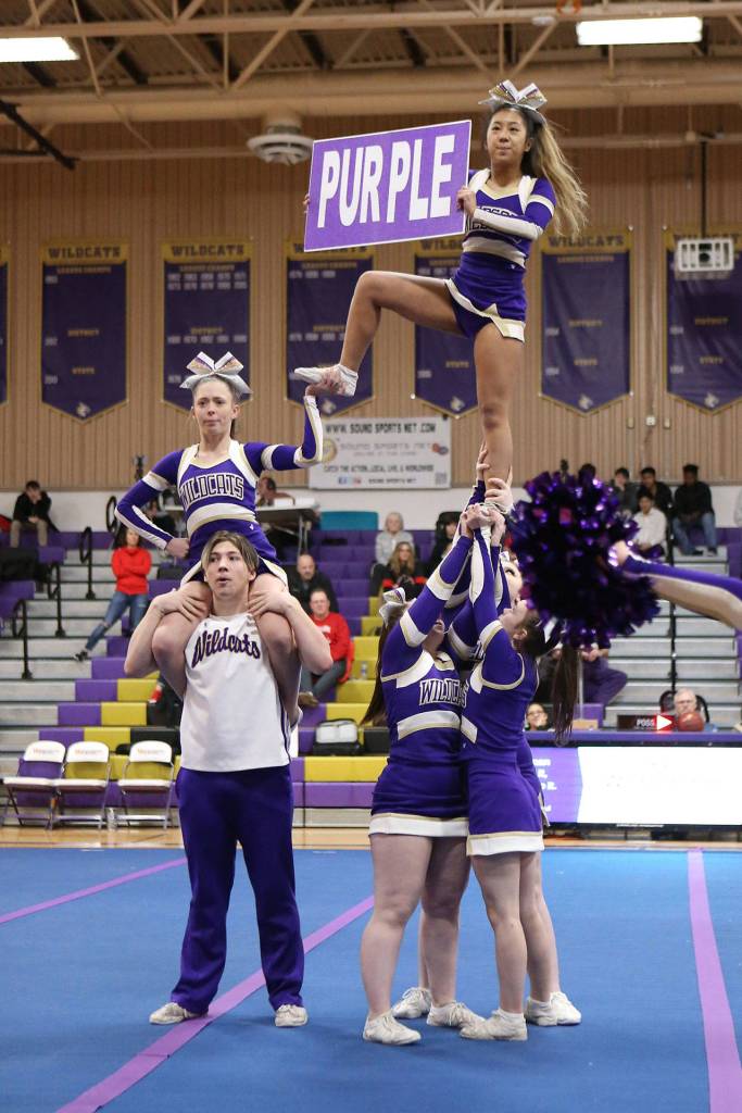 Oak Harbors Jordan Hempeck (flyer on shoulders), Griffin Stein, Annaliza Toliniu (flyer), Asya Pressley and Morgan Roundy (basing) and Emily Stanek (backspot).(Photo by John Fisken)