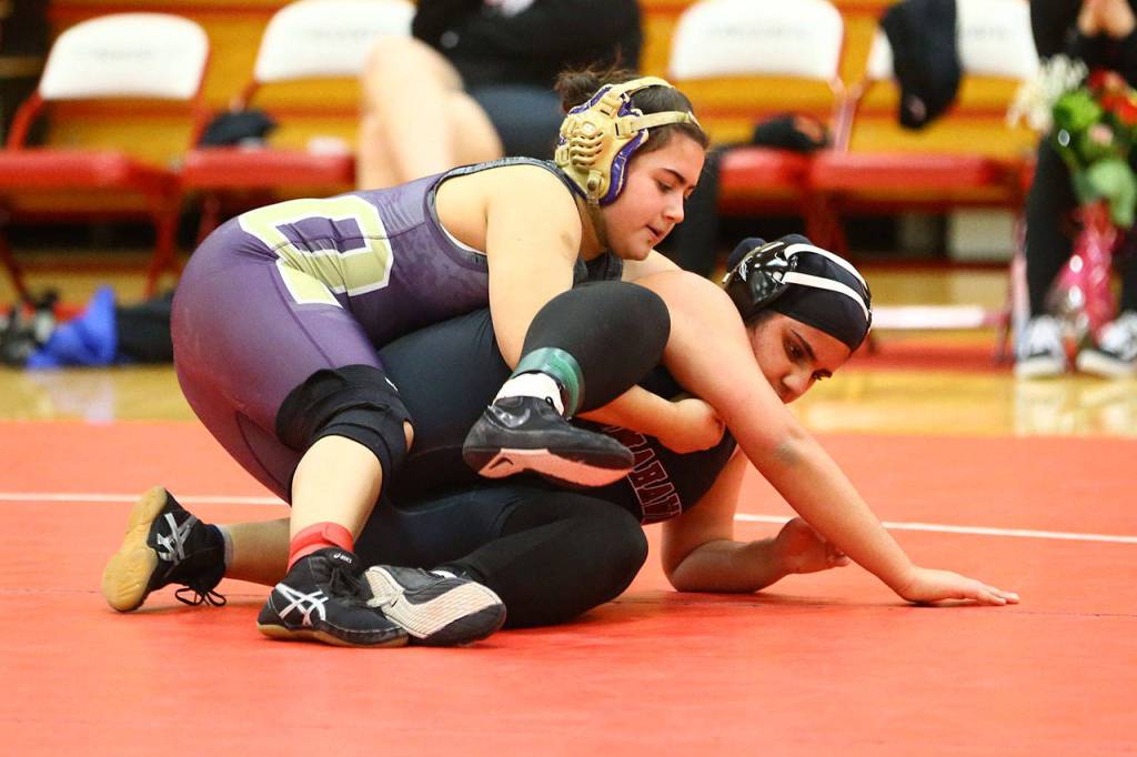 Oak Harbors Gaby Suarez-Flores, top.(Photo by John Fisken)