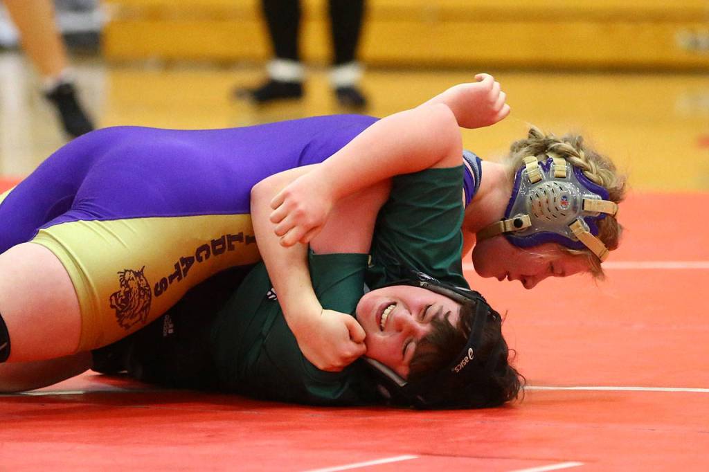 Oak Harbors Aly Grose, top.(Photo by John Fisken)
