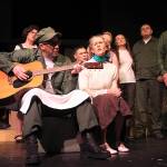 Pvt. Lopez and Lt. Louise Kimble, played by Jason Herken and Vicky Canales Riemer, perform a song that will be familiar to fans of the movie or TV show M*A*S*H during Whidbey Playhouses production of the play.