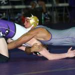 Jamal Graham, right, takes control of Anacortes Gavin Lang.(Photo by John Fisken)
