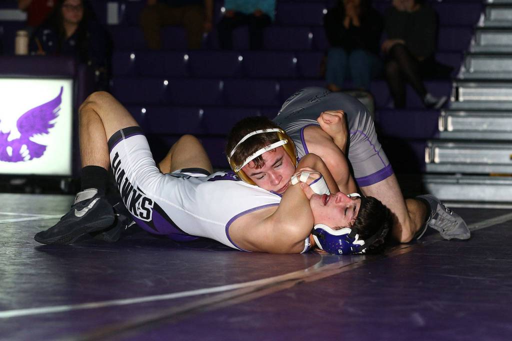 Oak Harbors Timothy Powers pins Joey Chonka. (Photo by John Fisken)