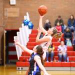 Tia Wurzrainer scores on a fast break for Coupeville.(Photo by John Fisken)