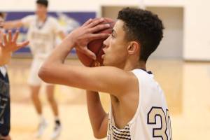 Wildcats fall to Eagles / Boys basketball