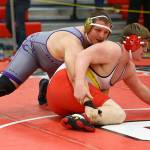 Ivan Snyder, top, tries to break down his opponent. (Photo by John Fisken)