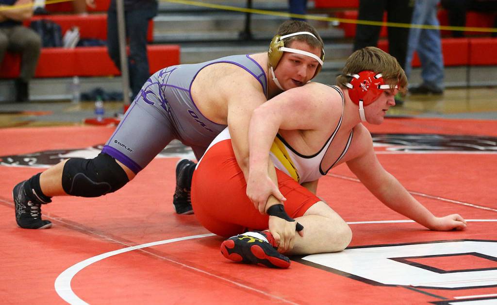 Ivan Snyder, top, tries to break down his opponent. (Photo by John Fisken)