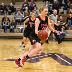 Anya Leavell leads the fast break. (Photo by John Fisken)