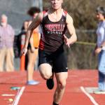 SeanToomey-Stout heads down the long jump runway. He is the defending league champion in the event. (Photo by John Fisken)