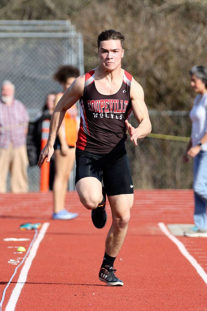 SeanToomey-Stout heads down the long jump runway. He is the defending league champion in the event. (Photo by John Fisken)