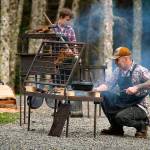 Photos provided                                Chef JP Dowdell, right, and firemaster Baron Dyan cook food on a fire table of Dowdells creation. Below left, Jess Dowdell, owner of Roaming Radish catering, grills over a fire. Below right, co-founder Russell Sparkman brings his enthusiasm for branding and marketing to Food, Fire and Iron.