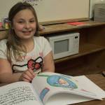 Photo by Brandon Taylor/Whidbey News-Times                                Kamie Chesser, 9, used her friends markers to color her picture of zooplankton.