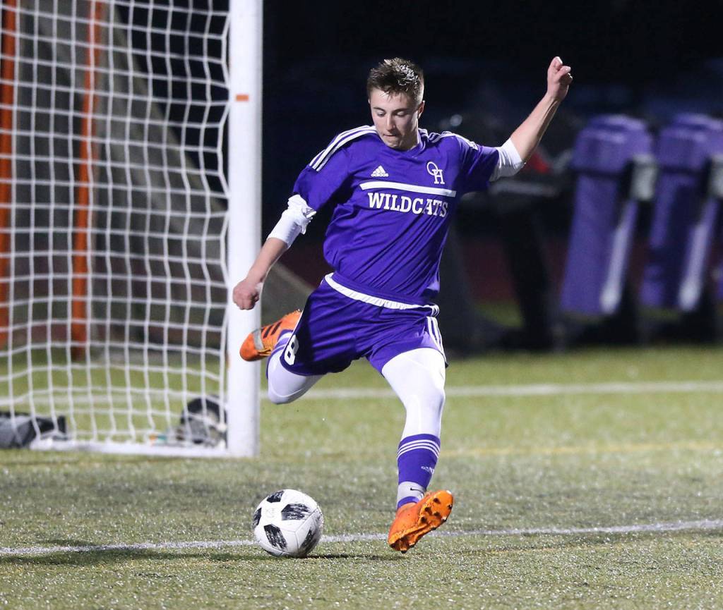 Ridgely Briddell puts the ball in play. (Photo by John Fisken)