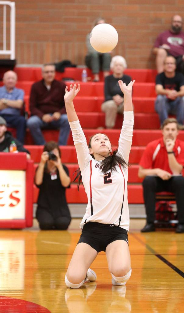 Smith put the volleyball teams offense in motion as the Wolves setter. (Photo by John Fisken)
