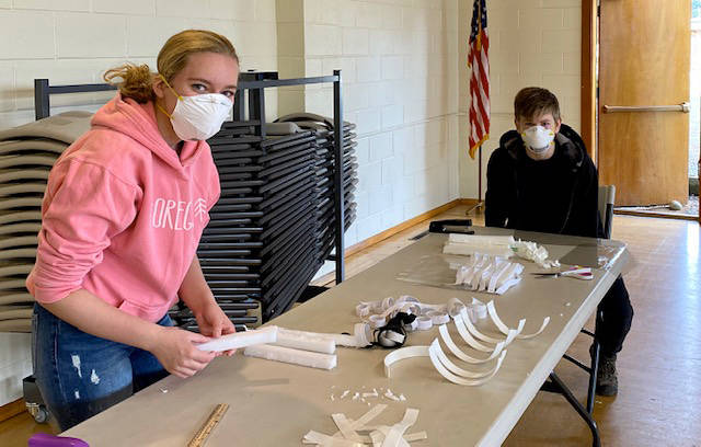 Residents craft face masks in response to shortage