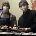 David Krolokouski and Juan Zalapa, right, prepare meals every Sunday in the kitchen of Pickles Deli in Clinton.